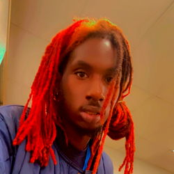 Young Man with Red Hair and Long Braids
