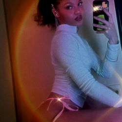 OnlyFans Model A❣️ Posing with Phone in Racy Photo