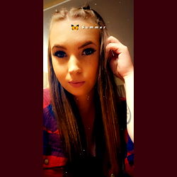 OnlyFans Model Aislyn Chilton, Casually Dressed in a Blue Shirt and Flannel