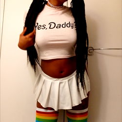 E, OnlyFans Model from Kansas, in a Rainbow Striped Outfit