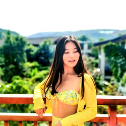 FancyYanYan on a balcony