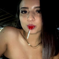 Caro from OnlyFans, enjoying a refreshing popsicle