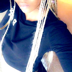 Young Adult Woman with Braids and Camouflage Outfit in Onlyfans Model Photo